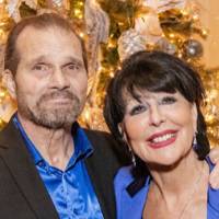 President Philomena Mantella and husband smiling at camera